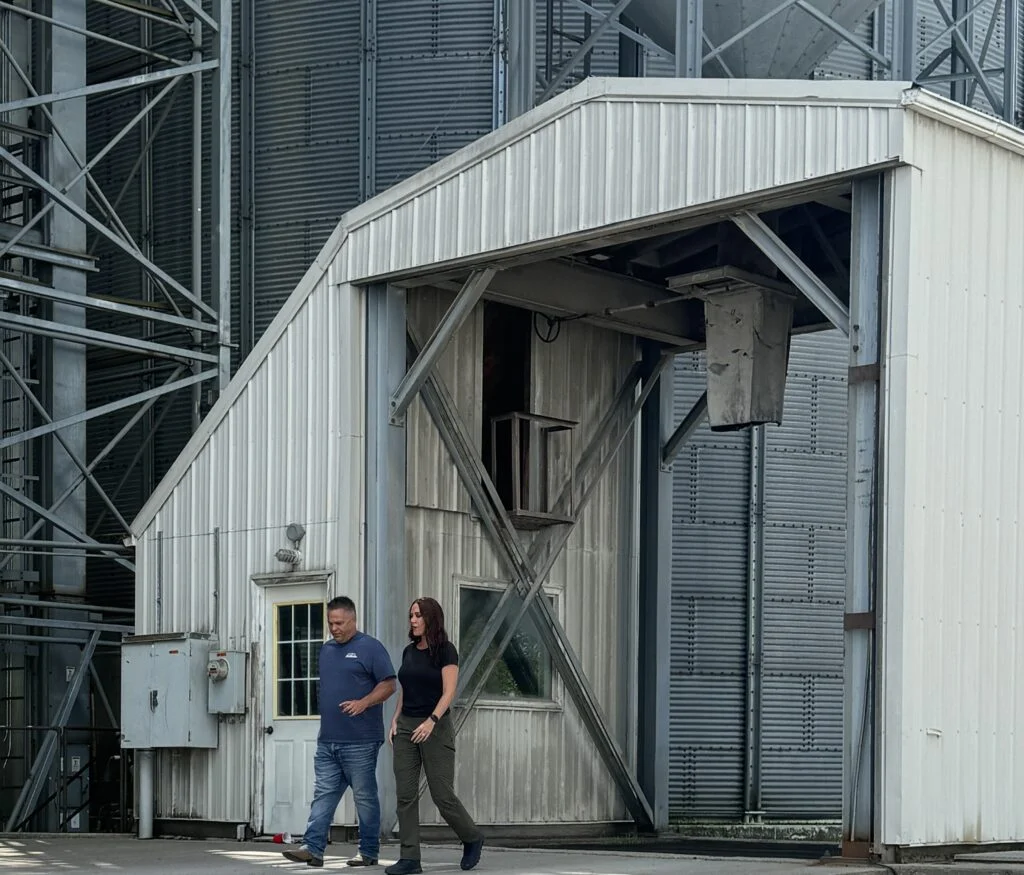 appraiser with client appraising industrial property providing appraisal services